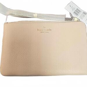 Kate spade wristlet. Pebble Oatmeal Colored Leather